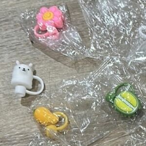 Stanley/Yeti silicone straw toppers or charms, designed to cover the tips